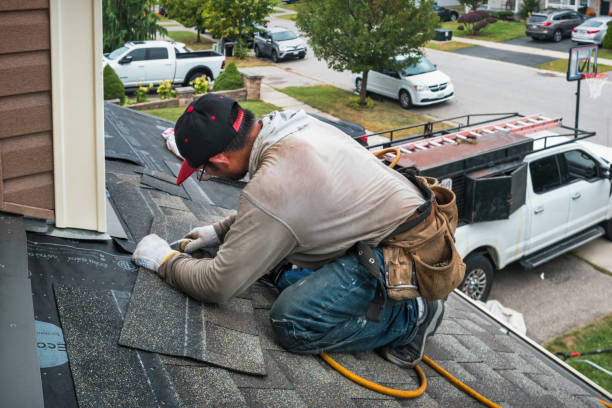 Professional Roofing technician working in Cumberland, WI
